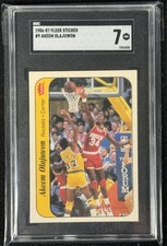 1986 Fleer Basketball Sticker #9 Akeem Olajuwon Rookie RC SGC 7