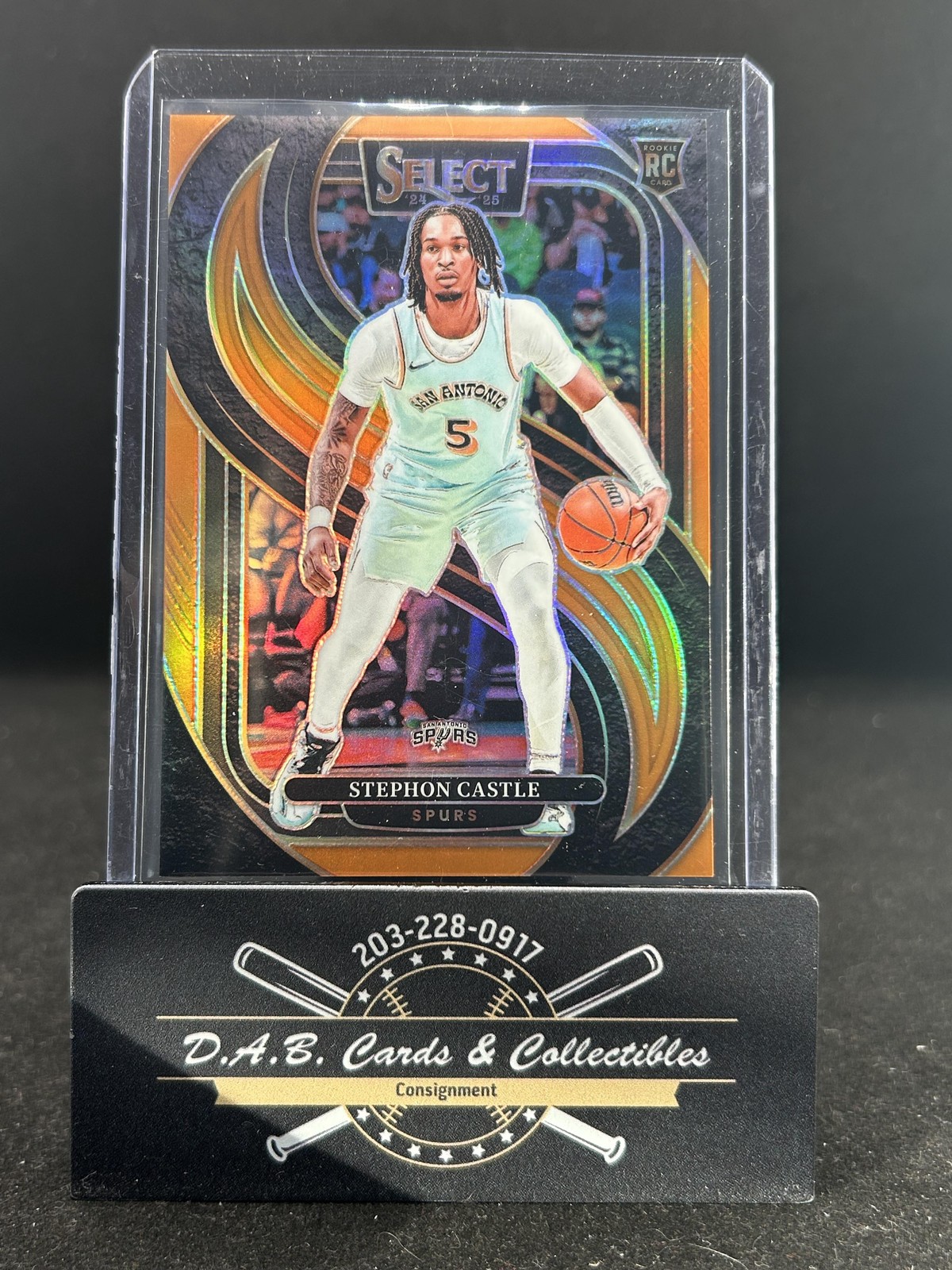 2024-25 Panini Select #175 Stephon Castle Orange Prizm Rookie #/65 Spurs J15