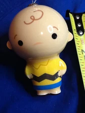 CHARLIE BROWN CHRISTMAS ORNAMENT, CERAMIC 3.5" PEANUTS WORLD WIDE LLC  12*9*23C