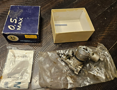 Vintage O.S. MAX- 25 RC 2 stroke Glow Plug engine with muffler in the box, Used