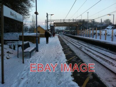 PHOTO  SNOWY SCENE AT MARKS TEY STATION ON A DAY WHEN MUCH OF THE REGIONS TRANSP