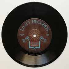 Manwel T - Livity Horns (7", Single) (Near Mint (NM or M-)) - 2409541319