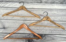 3 VINTAGE WOODEN CLOTHES HANGERS - 2 ADVERTISING HILTON  SENECA HOTELS