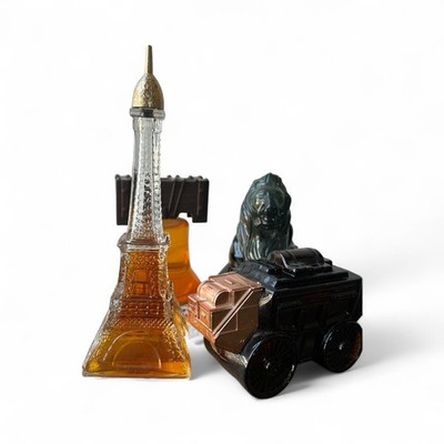 Lot Of 4 Avon Colognes And Aftershaves Wagon, Lion, Bell, Eiffel Tower