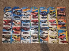 Nissan Datsun Hotwheel Lot of 27 Very Desirable Sealed New In Box 1/64