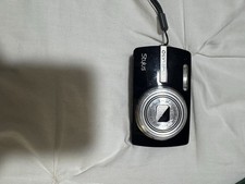 Olympus Stylus Digital Camera Used with Charger and Battery. Read Description