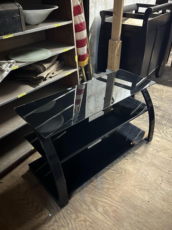 tv stand/entertainment center. Dark glass shelves