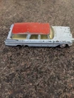 RARE VINTAGE CORGI TOYS # 219 PLYMOUTH SPORTS SUBURBAN STATION WAGON DIECAST CAR