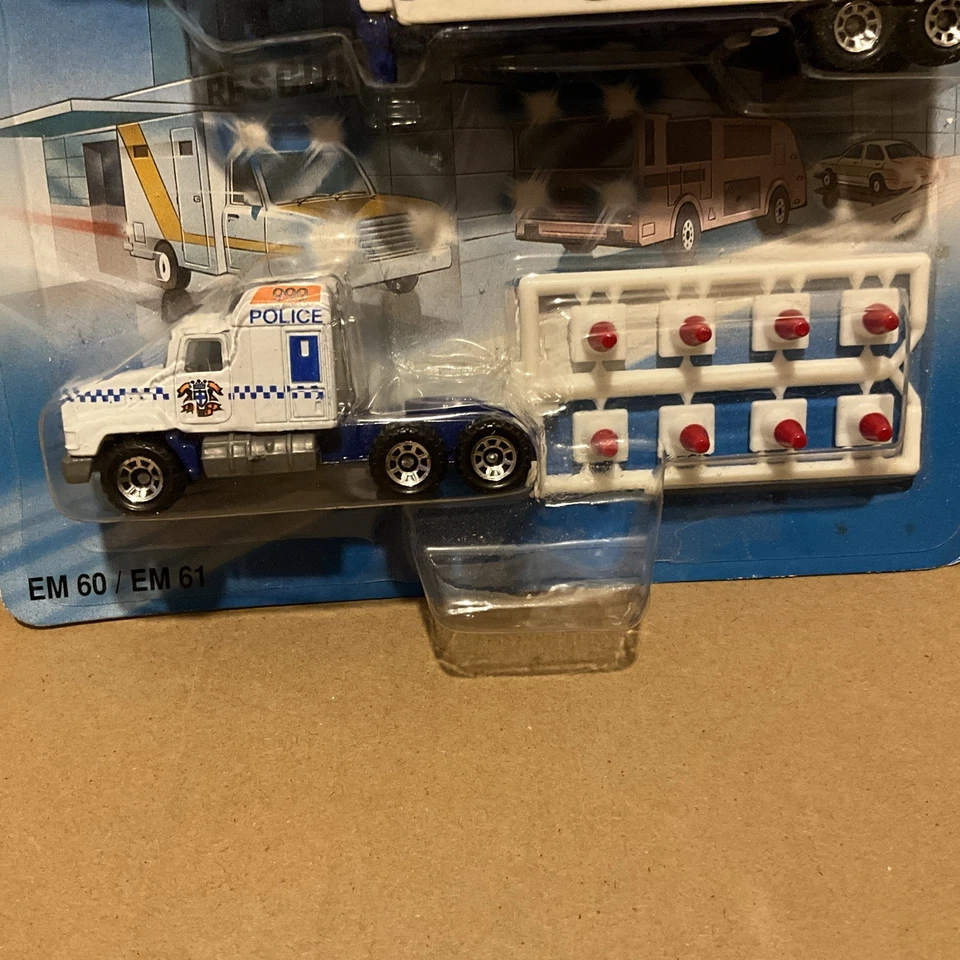 MATCHBOX EM 60 / EM 61 MACK TRUCK & TRAILER  POLICE UNIT- ON CARD - Image 2 of 4