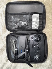 E88 Pro foldable mini drone with remote controller, accessories & carrying case