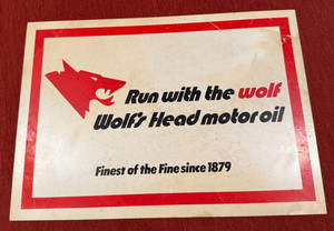 Vintage Wolfs Head Motor Oil Plastic Sign Gas station dealer Run with the Wolf