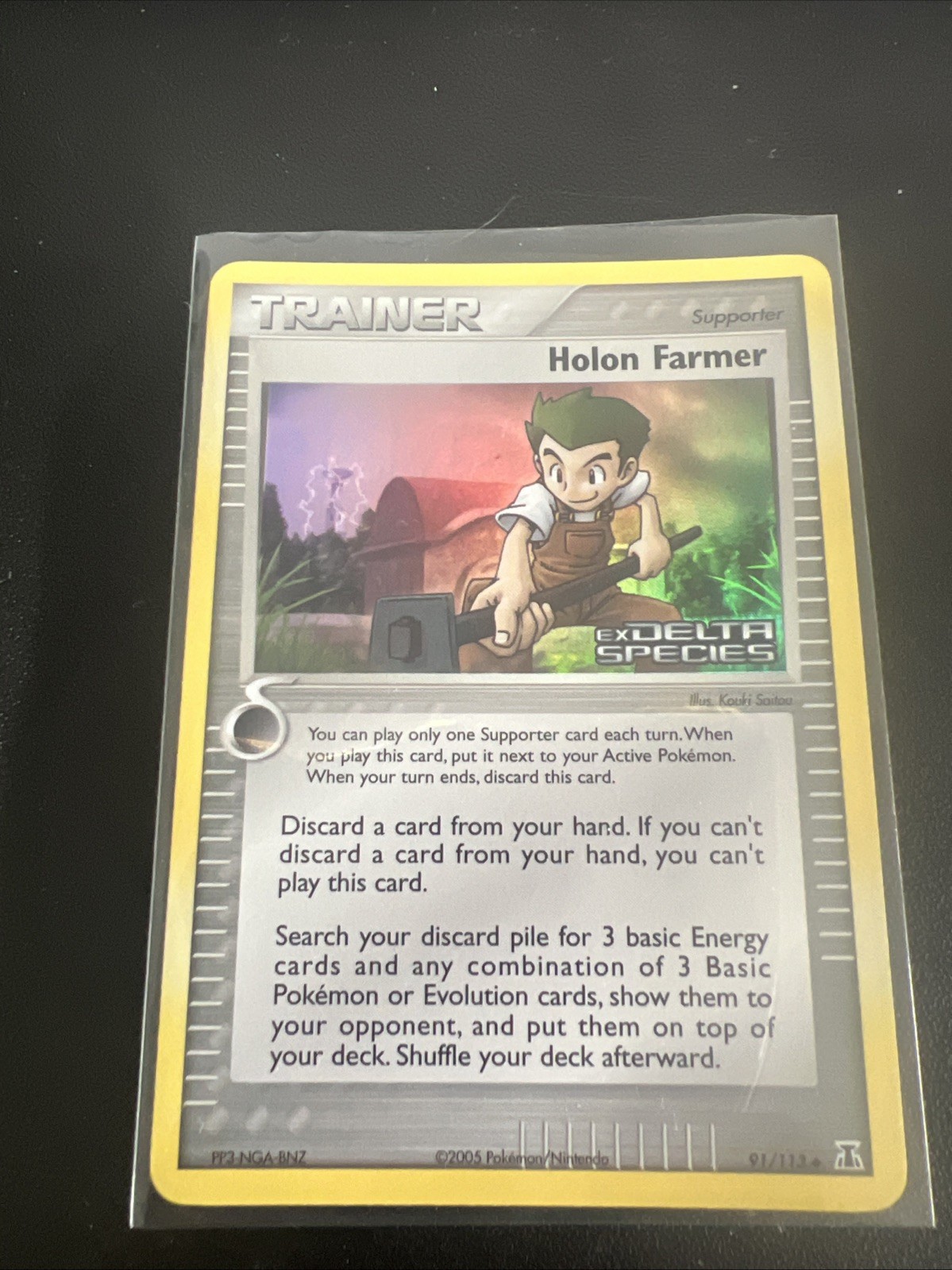 Holon Farmer 91/113 Delta Species Reverse Holo Stamped