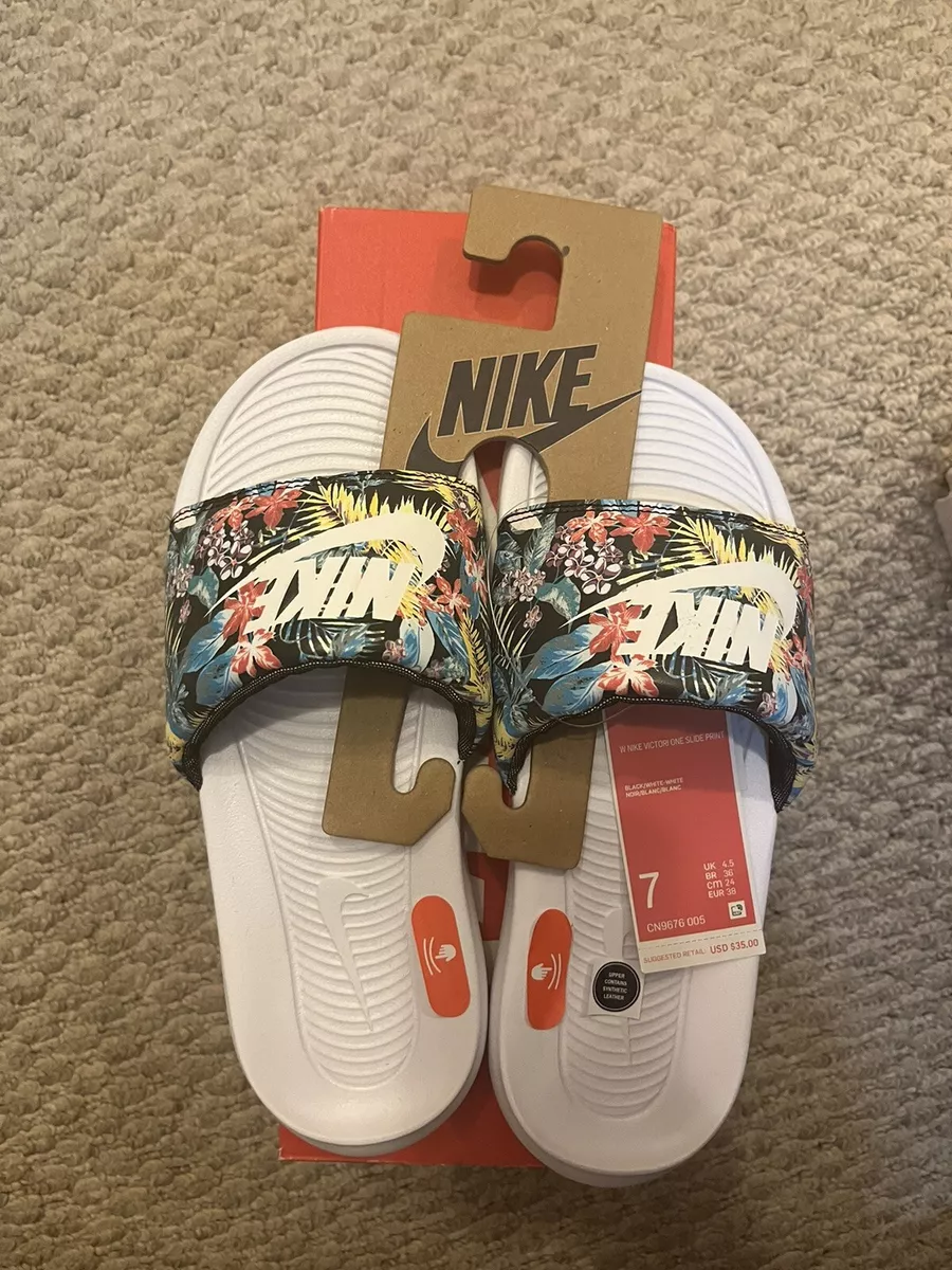 Floral print hotsell nike slides