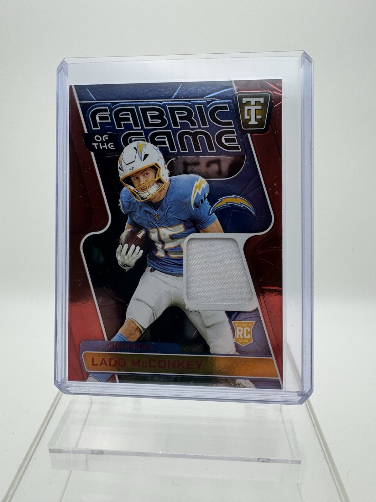 Ladd McConkey Panini Totally Certified Fabric of the Game Rookies #FGRLMC Mirror Red