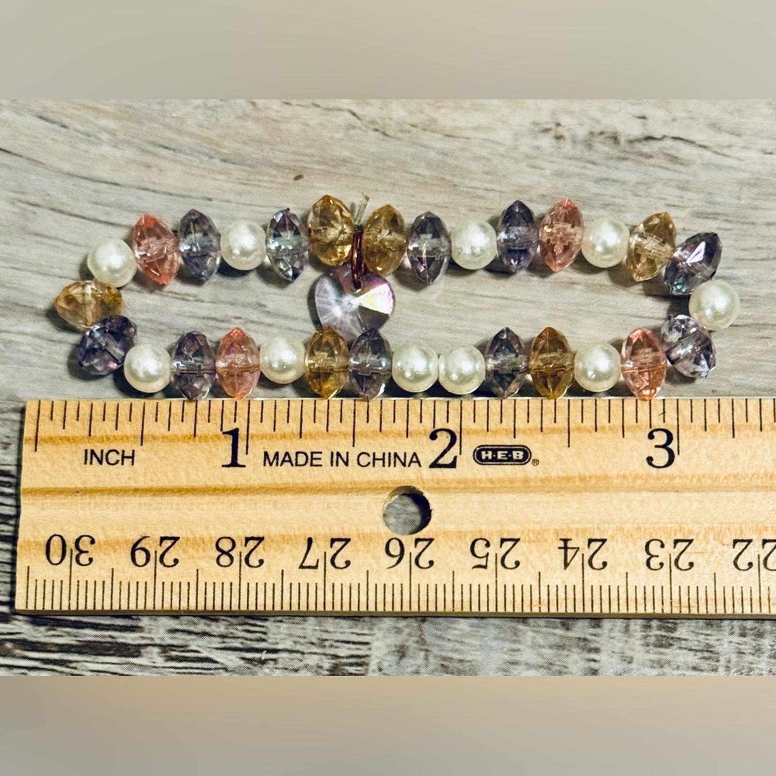 A multi-color translucent crystal bead bracelet w… - image 5