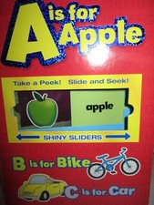 A is for Apple Shiny Sliders - board book 7 Cats Press