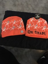 HALLOWEEN LIGHT UP ORANGE BEANIES X2 WITH DANCING WHITE SKELETONS ONE SIZE NEW 