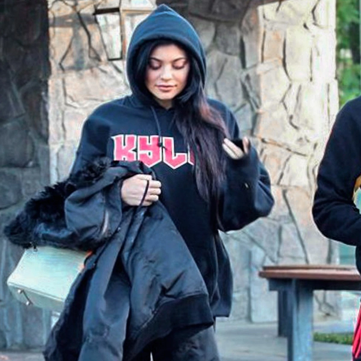 Kylie Jenner in grey Nike Air Dior sneakers on August 28