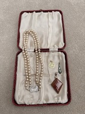 A silver jewellery group necklace with sterling silver clas ver-mounted pendant