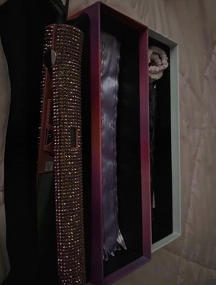 pink bedazzled straightner new never has  been used before!!!!!