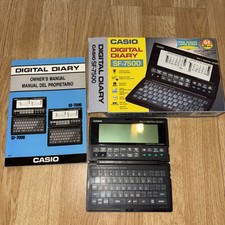CASIO SF 7500 Electronic Digital Diary 64k retro rare with instructions and case