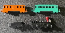 Lot of 4 Midgetoy trains. Intact excellent condition