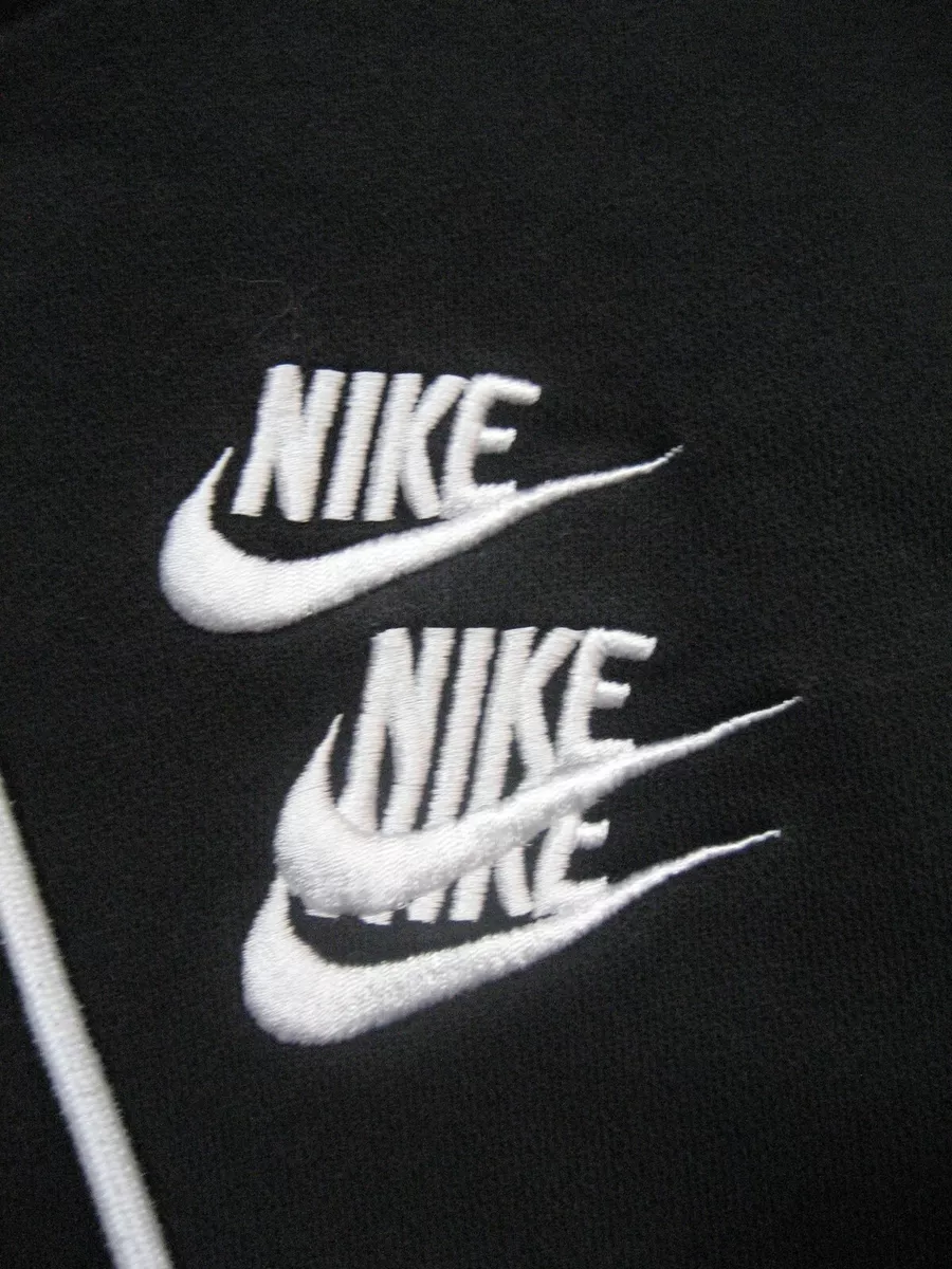 Nike swoosh on tour pack hoodie in black hot sale