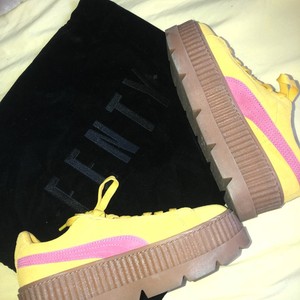 yellow and pink puma creepers