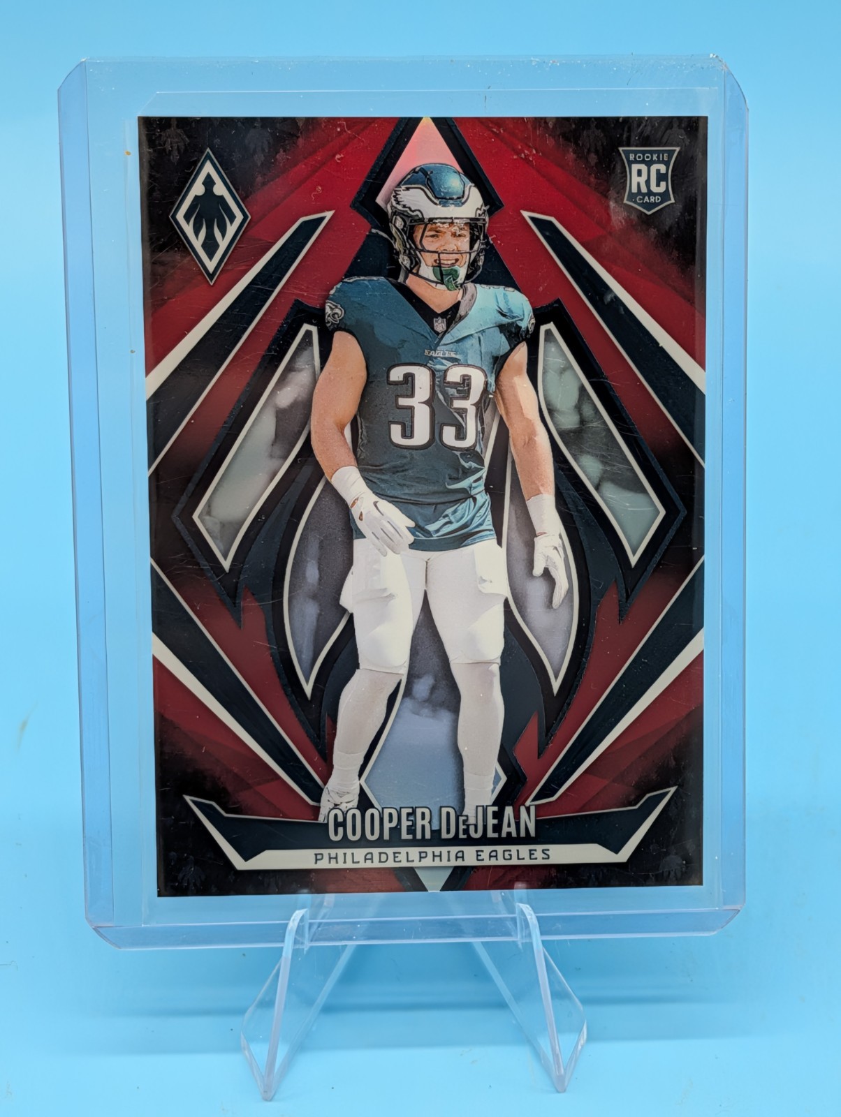 2024 Panini Phoenix - Rookies Cooper DeJean #171 Red Fade 217/299 (RC) Eagles