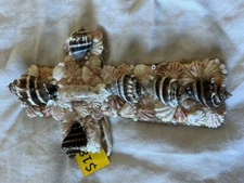 Cross Featuring King Crowns And Kitten Paws With An Olive Shell Center 9"x5 1/2"