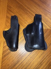 2 Black Leather Small Holsters One is custom made