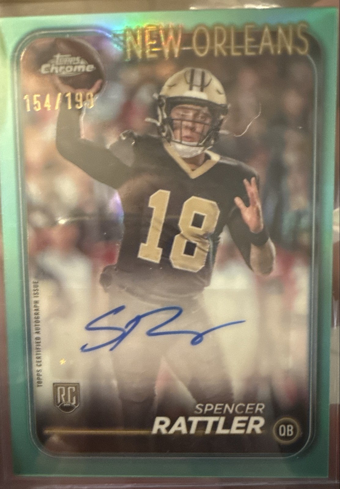 2024 Topps Chrome Rookie Autographs Spencer Rattler Aqua Refractor /199 (AU, RC)