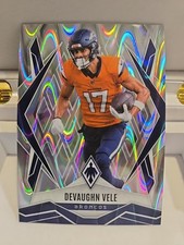 2025 Panini Phoenix - Devaughn Vele #14 Wave Refractor Denver Broncos