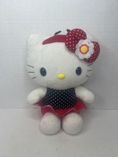 Juguete de peluche Sanrio Hello Kitty en top de lunares negros y falda roja