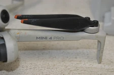 DAMAGED BUT WORKING DJI Mini 4 Pro Drone w/ RC-N2 Controller