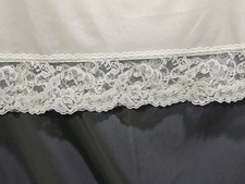 Half Slip Vassarette Ivory Nylon With Lace Trim. Waist 26"-32" Length 28"