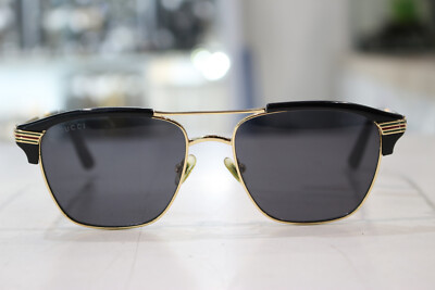 Gucci GG0241S Sunglasses in Black Gold Pilot Metal