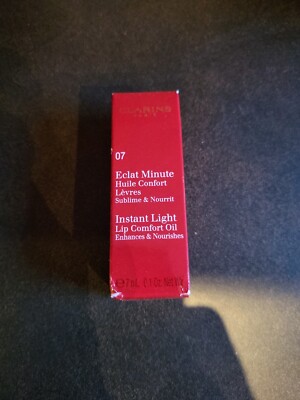 CLARINS INSTANT LIP COMFORT OIL ENHANCES & NOURISHES 07 HONEY GLAM