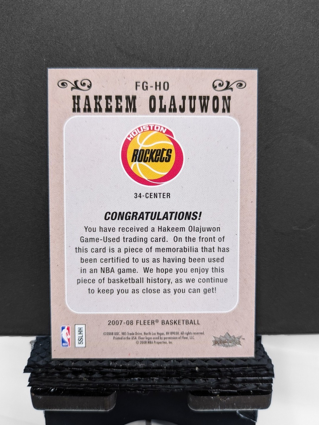 HAKEEM OLAJUWON 2007-08 NBA Fleer Feel the Game GAME USED MEM PATCH ROCKETS HOF view 2