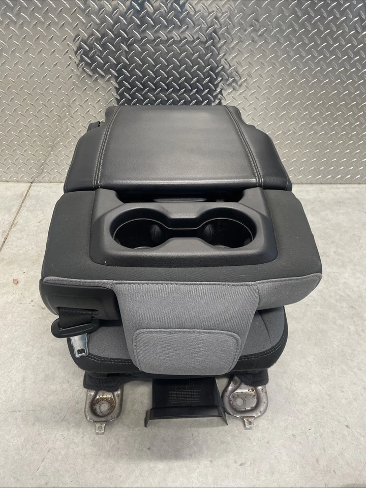 RAM 1500 2019-26 quinta cabina doble tela centro delantera asiento reposabrazos almacenamiento Foto 2 de 4