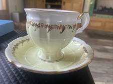 CROWN STAFFORDSHIRE Bone China Teacup  Saucer. Made In England Yellow Floral
