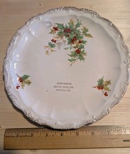 Hustler Wisconsin advertising plate Julius Mueller general merchandise Juneau Co