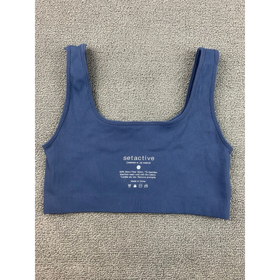 Conjunto de leggings sujetador deportivo acanalado azul medio activo para mujer Foto 4 de 4