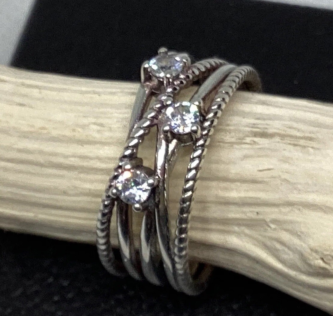 925 Sterling Silver, Sparkling Crossover Ring & Triple Clear CZ
