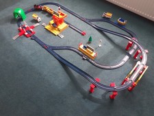 Vintage Tomy Train set with working train and freight station
