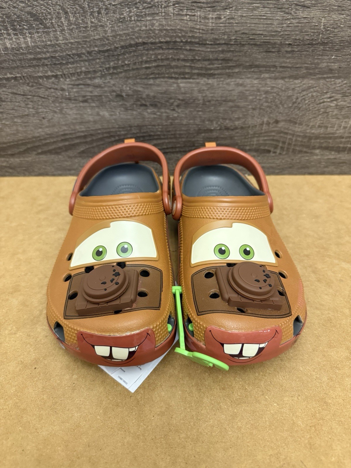 Crocs Disney Pixar Mater Unisex Size W7/M5 Brown Vented Heelstrap Slip On Clog