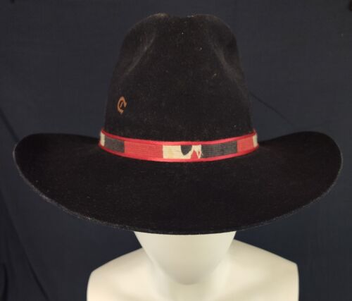 Red Charlie horse hat with Louis Vuitton patch