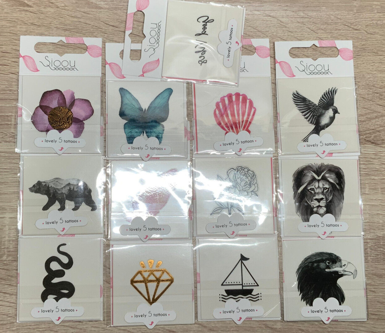 Tatoo temporaire Sioou sans douleur lot de 65pcs pour tester un motif