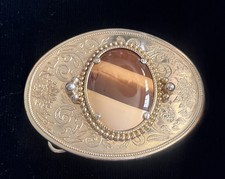 Vintage Metal gold and silver tone filigree design with cabochon belt buckle