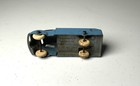 Vintage blue Tootsietoy #234 box truck with round wheels, made in U.S.A., on a plain white background.